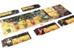 Jeu de société avec plateau, cartes dorées et pions colorés