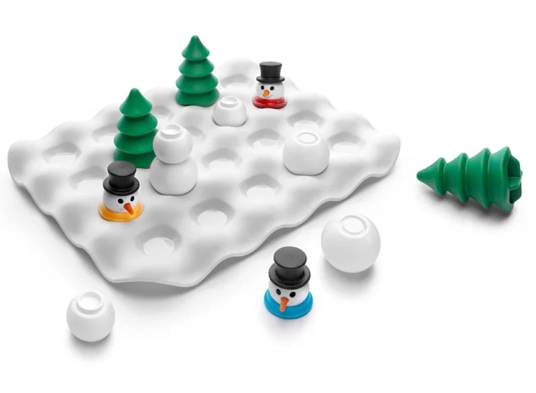 Jeu de construction hivernal avec bonhommes neige et sapins verts