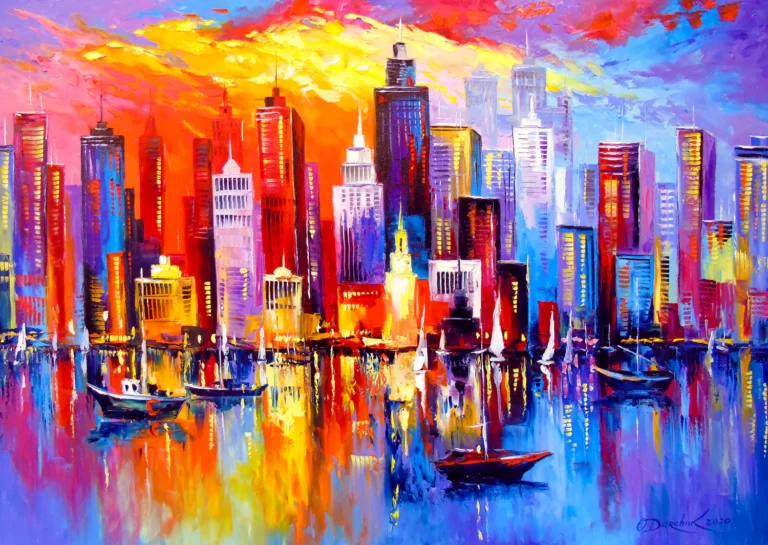 Skyline coloré au coucher du soleil et voiliers
