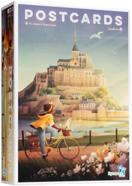 Boîte de cartes postales avec cycliste et château médiéval