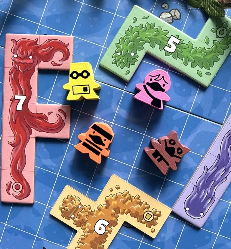Jeu de plateau avec tuiles colorées numérotées et pions personnages