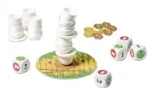 Jeu de société avec tour blanche, dés colorés et jetons